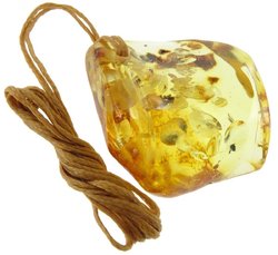 Figured pendant made of translucent amber